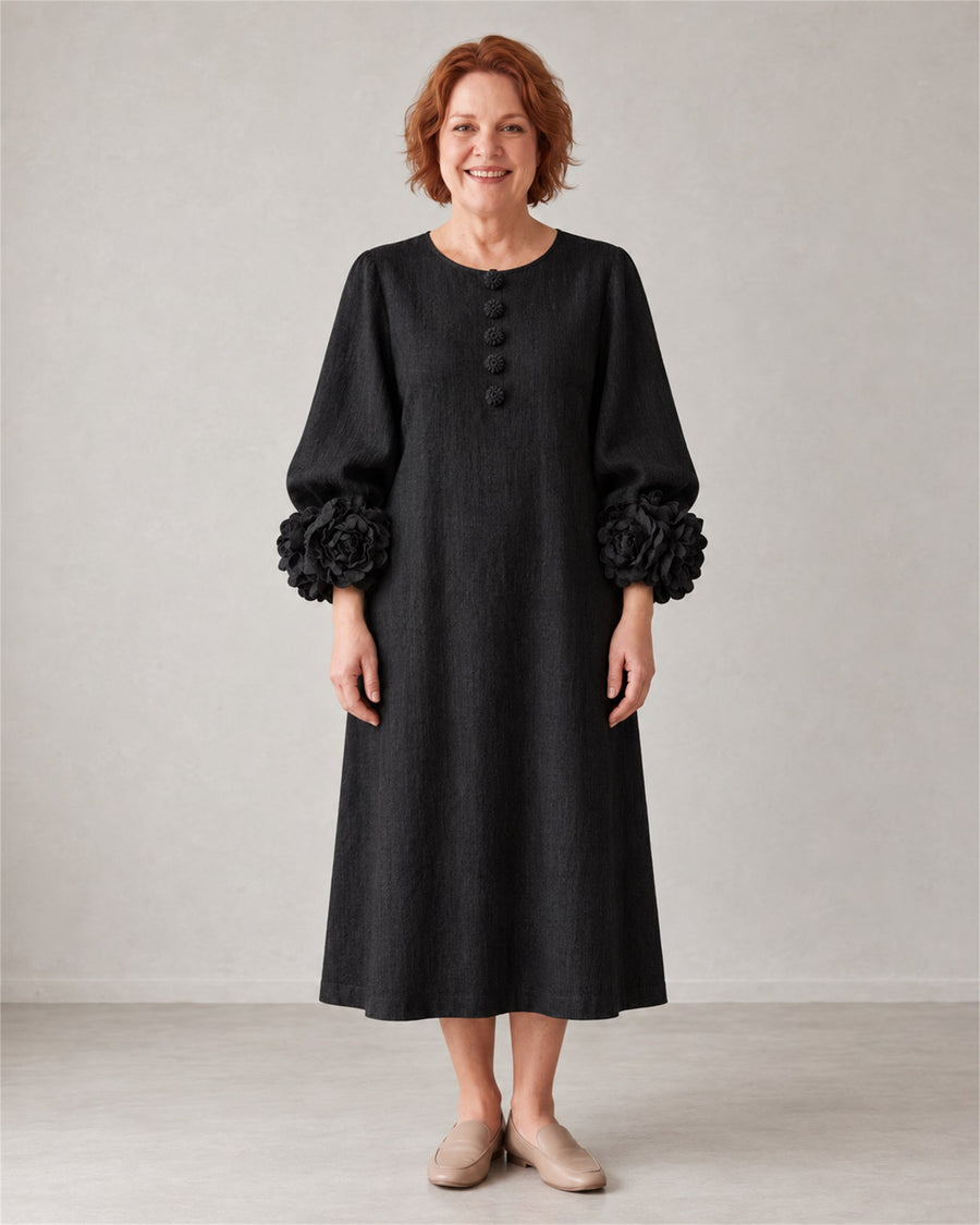 Theodosia rosette-cuff button midi dress in black, front view