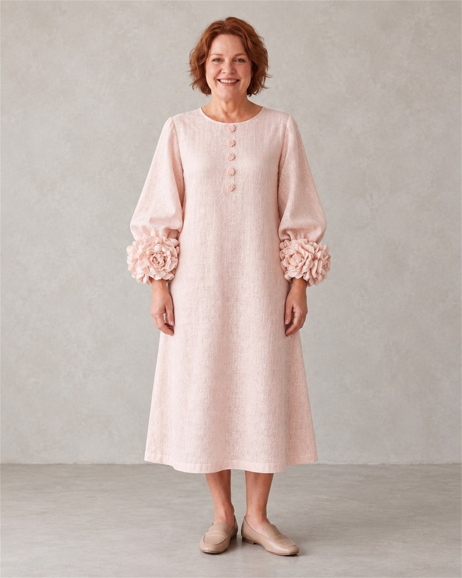 Theodosia rosette-cuff button midi dress in pink, front view